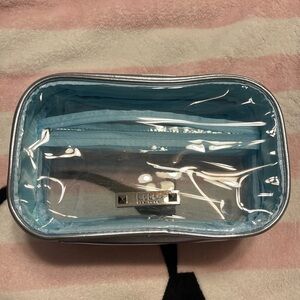 Nicole Miller cosmetic travel see thru bag with pockets inside great for travel